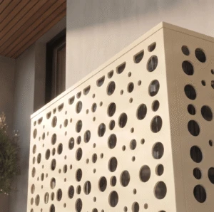 Orbia vue 1 Cache climatiseur extérieur, fixation murale au motif Orbia, finition ivoire.